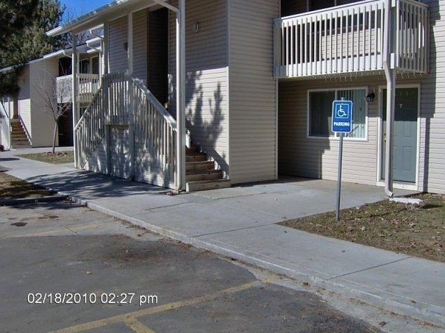 a house with a handicapped sign in front of it