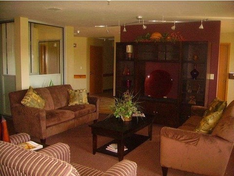 a living room with couches and a coffee table