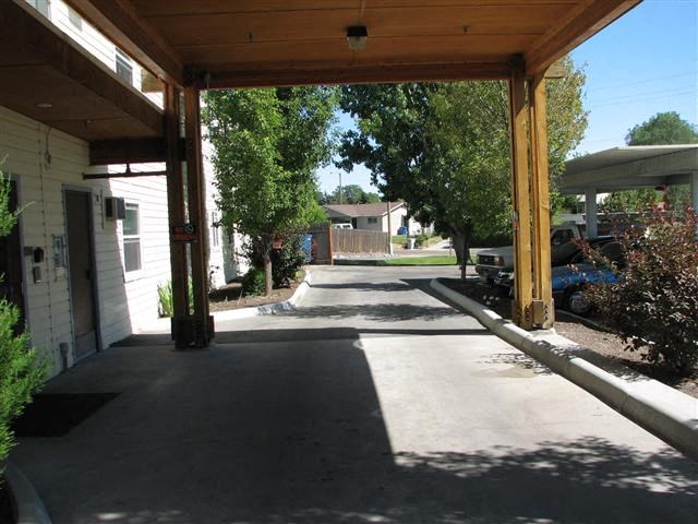a covered porch in front of a house