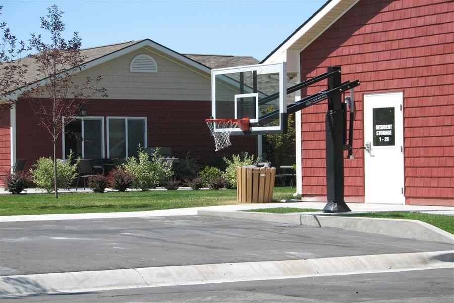 a basketball hoop in front of a house