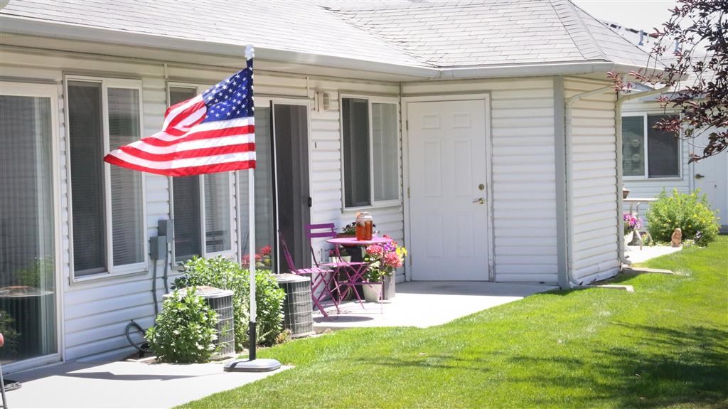 an flag on the porch of a house