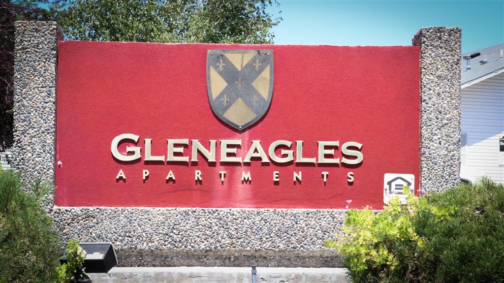 a sign for the apartments facility is shown