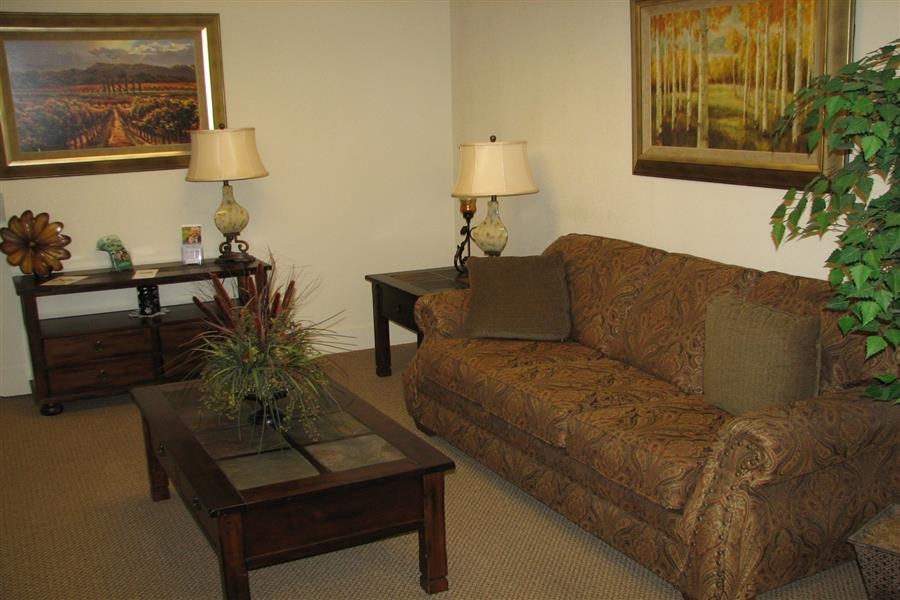 a living room with a couch and a coffee table