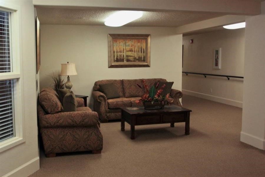 a living room with a couch and a table