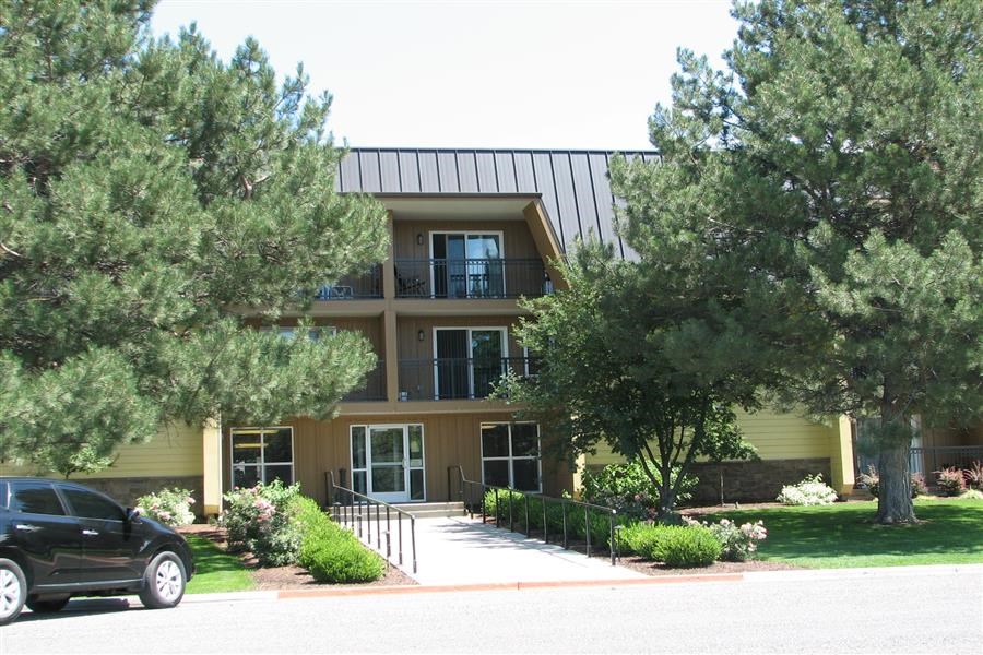 a house with a car parked in front of it