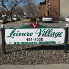 a street sign on the side of a road