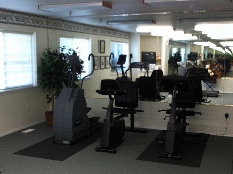 the gym in our office has a lot of exercise equipment