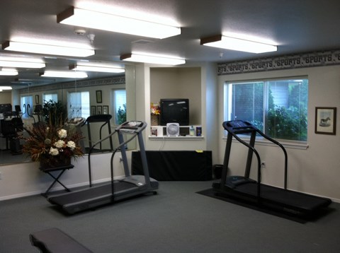the exercise room in our office is full of equipment
