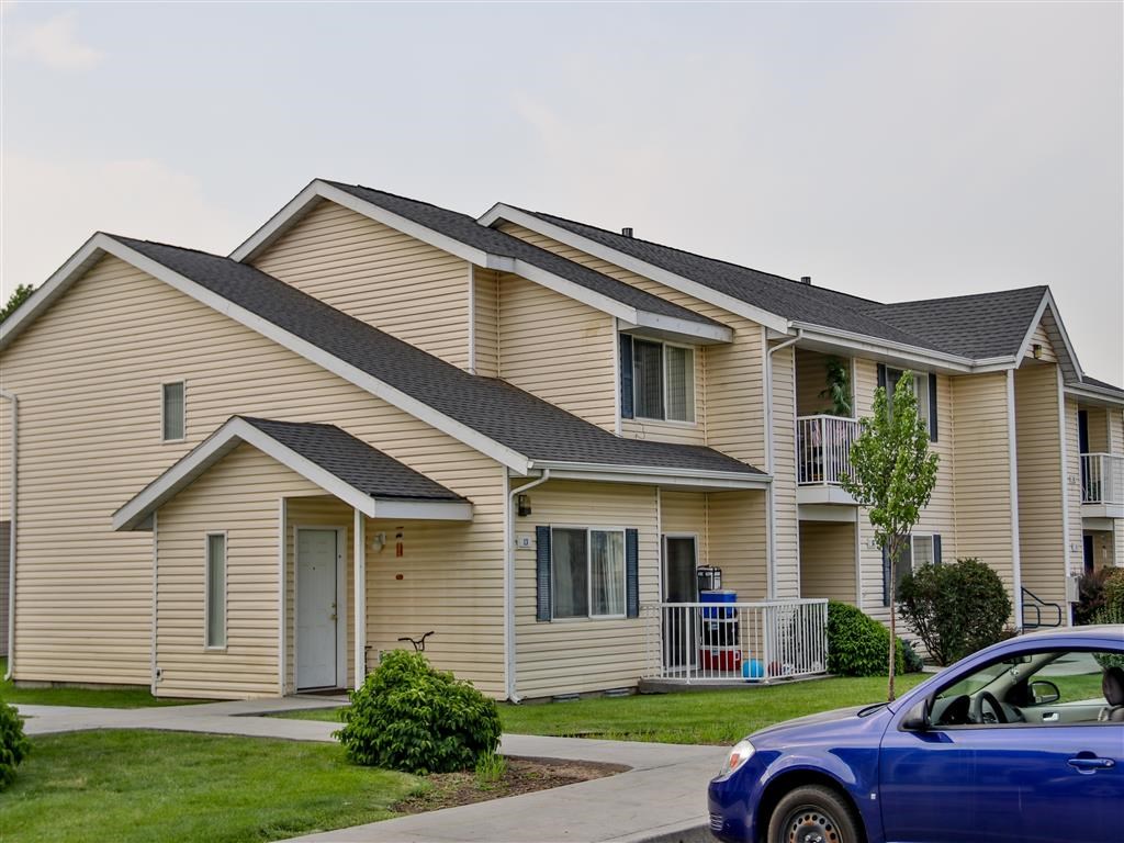 a car is parked in front of a house