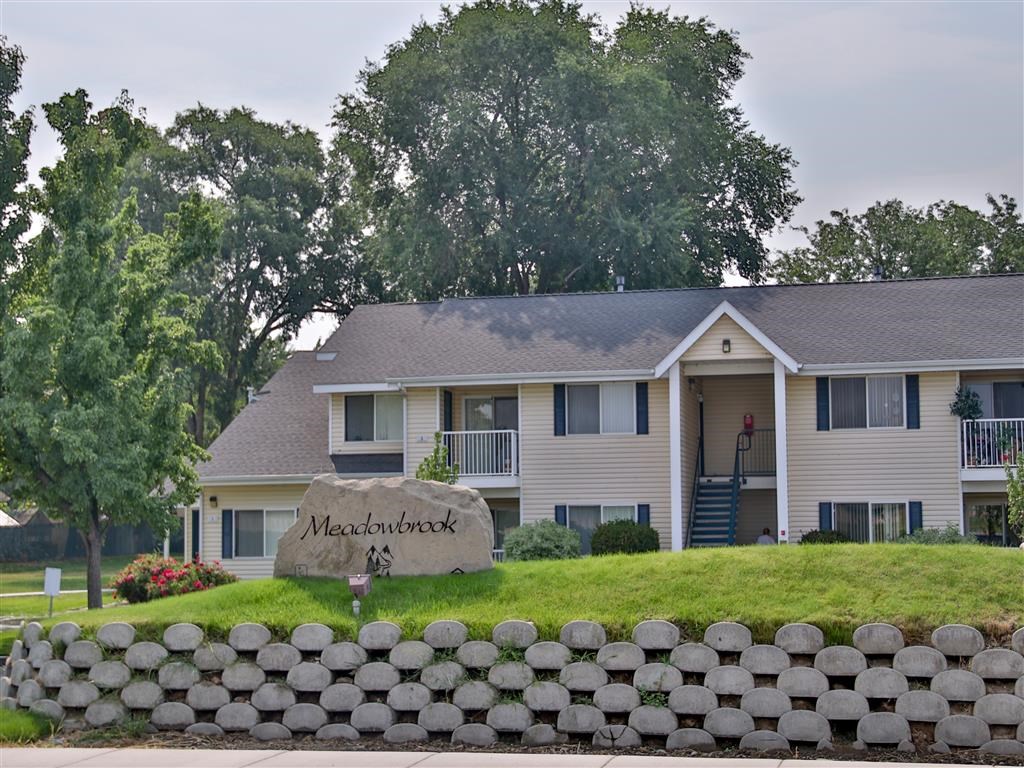a house with a sign in front of it