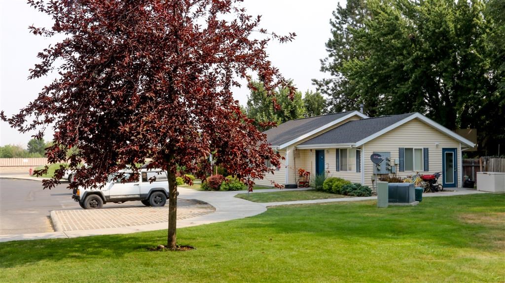 a house with a truck parked in front of it