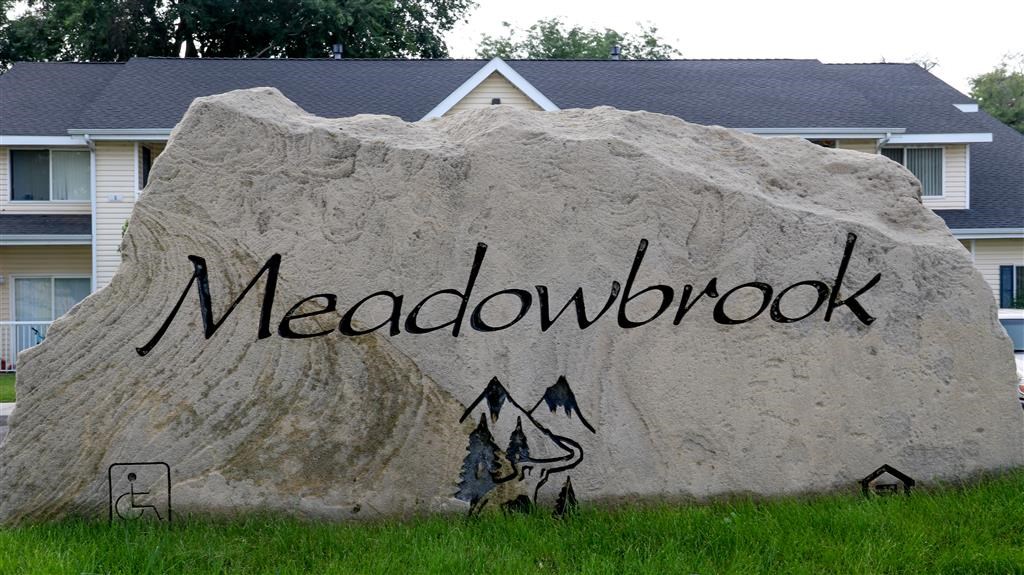 a large rock with the word written on it
