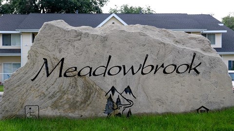 a large rock with the word written on it