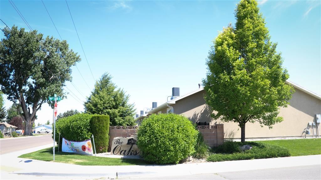 a building with a sign on the side of a street