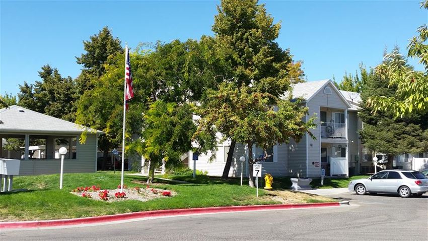 a white house with a flag in front of it