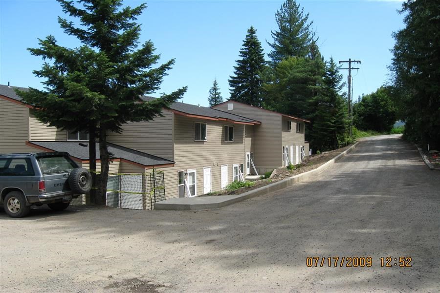 a house with a truck parked in front of it