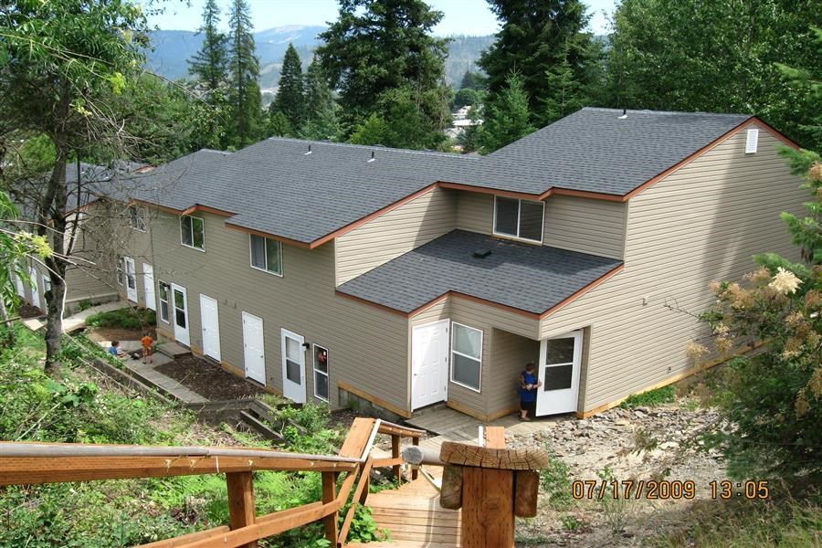 a view of a house from a deck