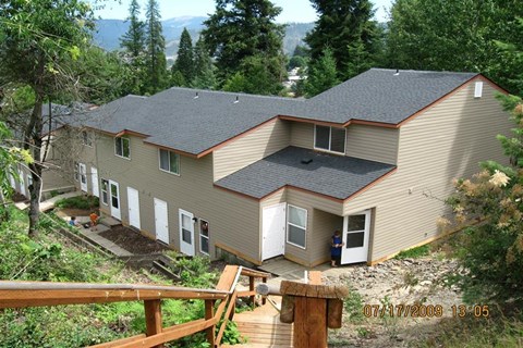 a view of a house from a deck