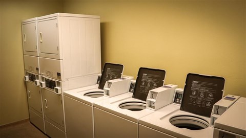 a kitchen with a stove and a bunch of appliances