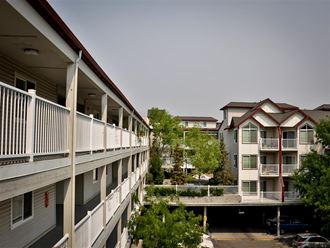 a row of apartment buildings with balconies