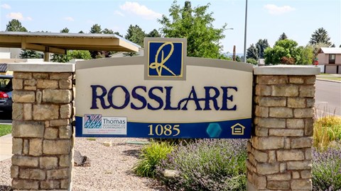 a sign for the rossdale sign in front of a building