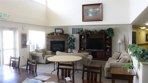 a living room with a couch and a table