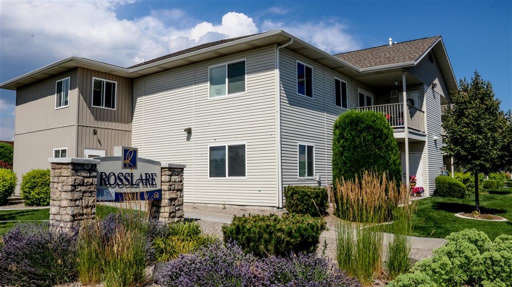 a house with a sign in front of it