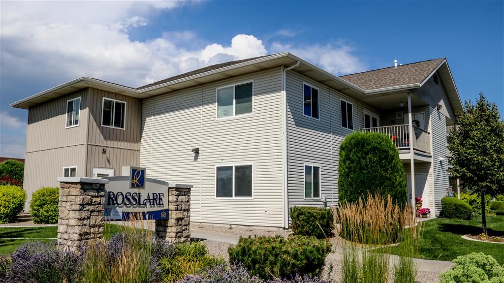 a house with a street sign in front of it