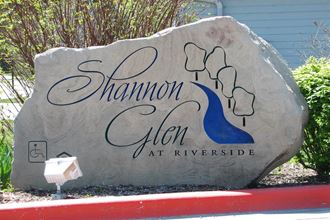 a stone sign for the shannon glen glen at riverside