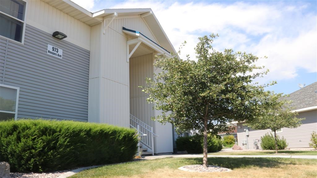 a building with a tree in front of it