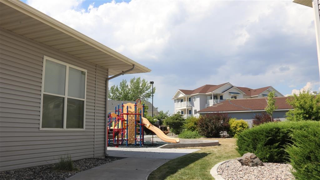 a playground in a yard of a house