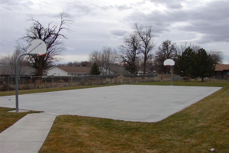 a basketball court with two basketball hoops on it