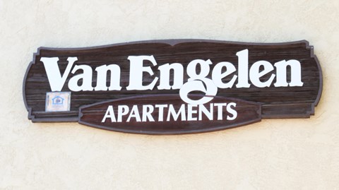 a sign on a wall that reads