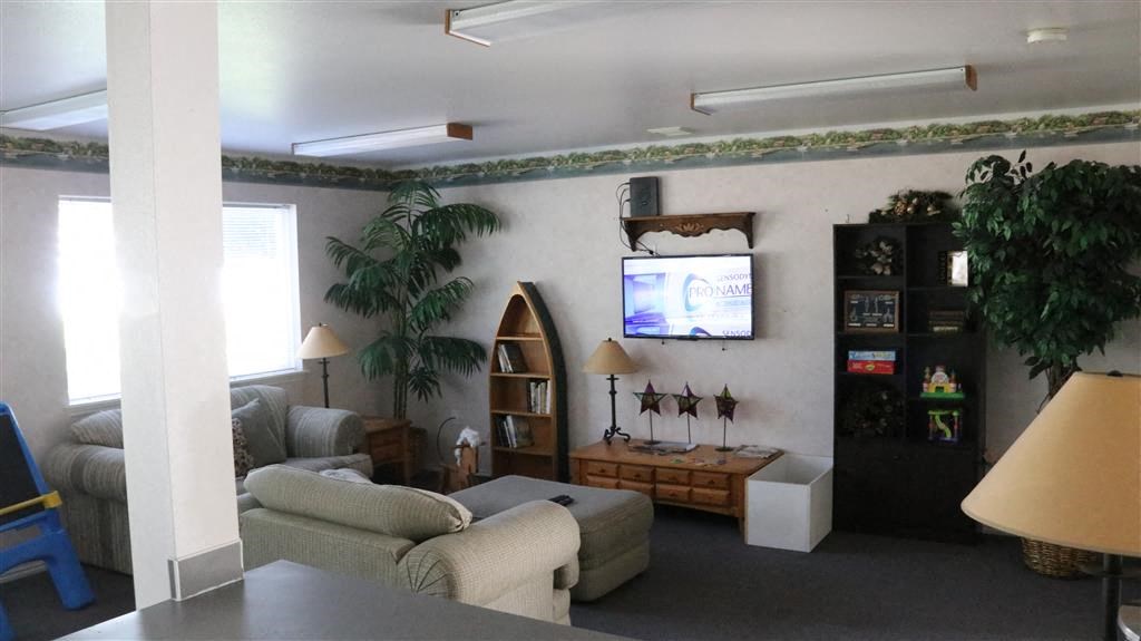 a living room with a couch and a television