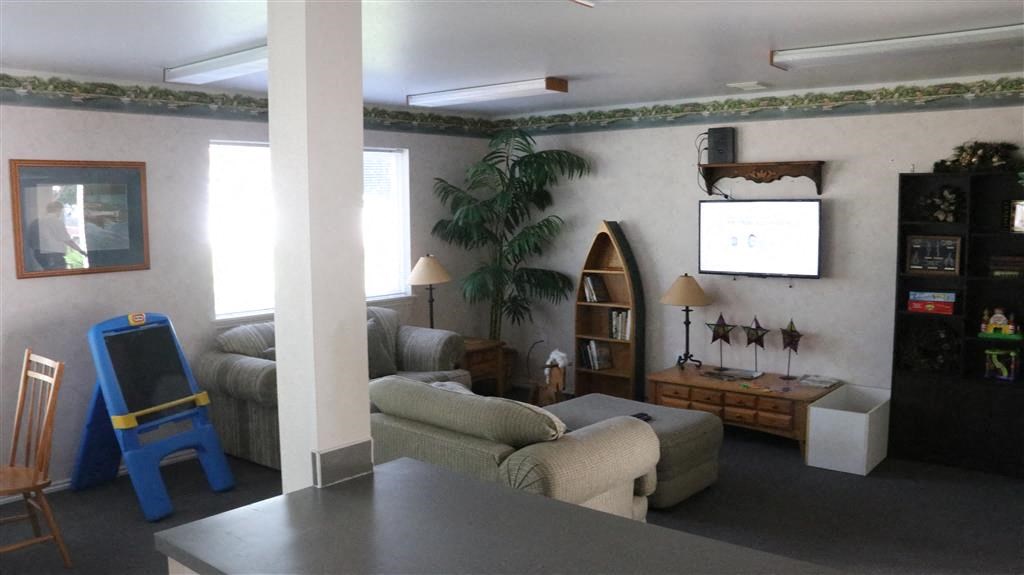 a living room with a couch and a television