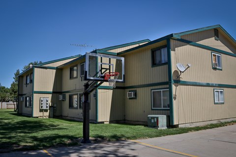 a basketball hoop in front of a building