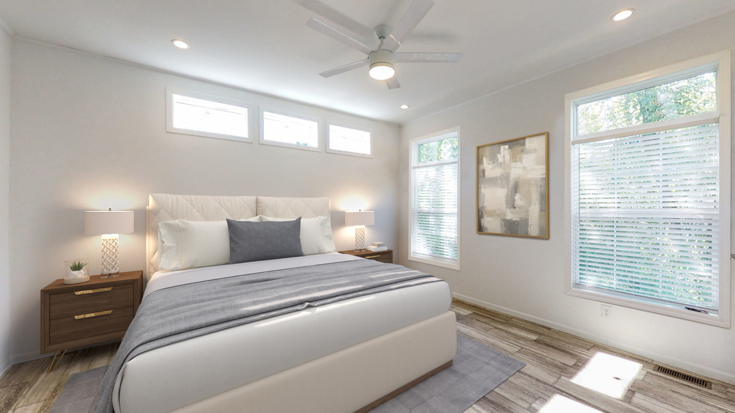 a bedroom with a bed and a ceiling fan