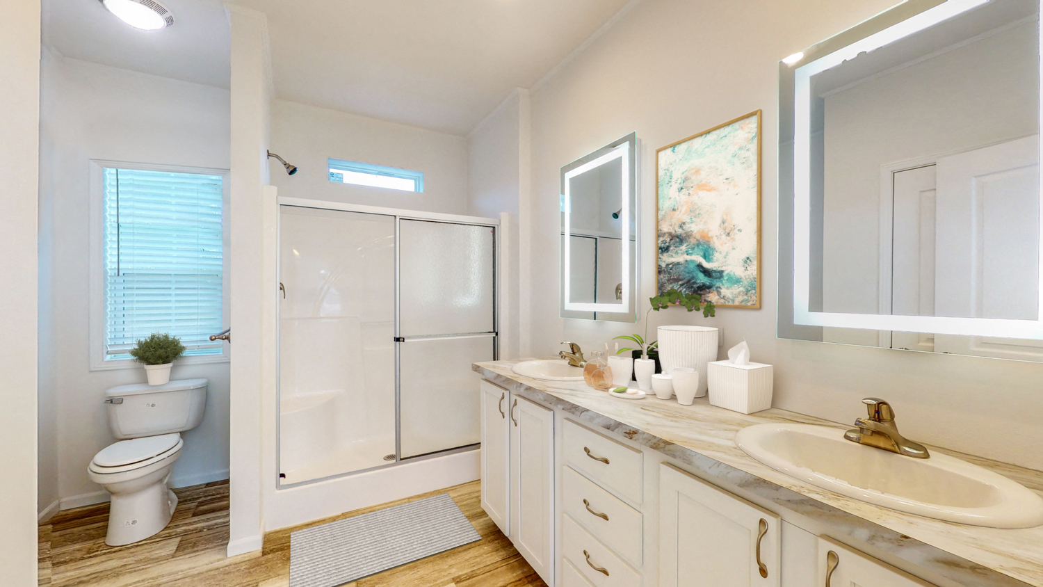 a bathroom with a sink and a toilet and a shower