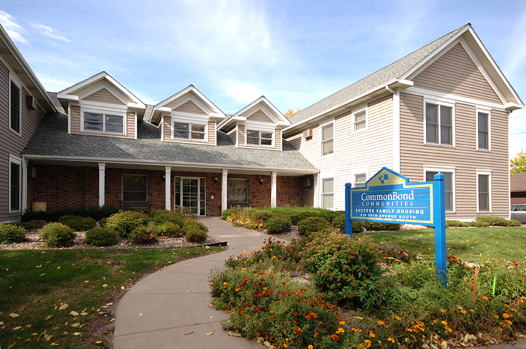 a building with a sign in front of it