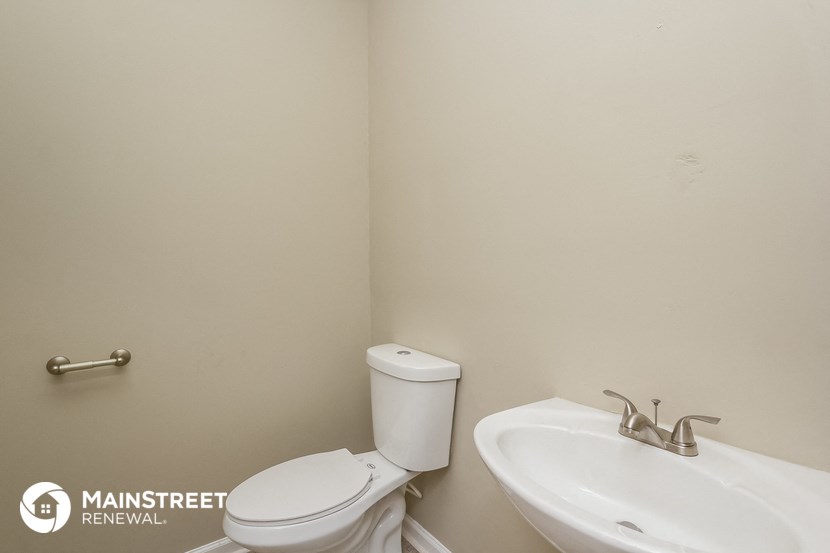 a small bathroom with a toilet and a sink