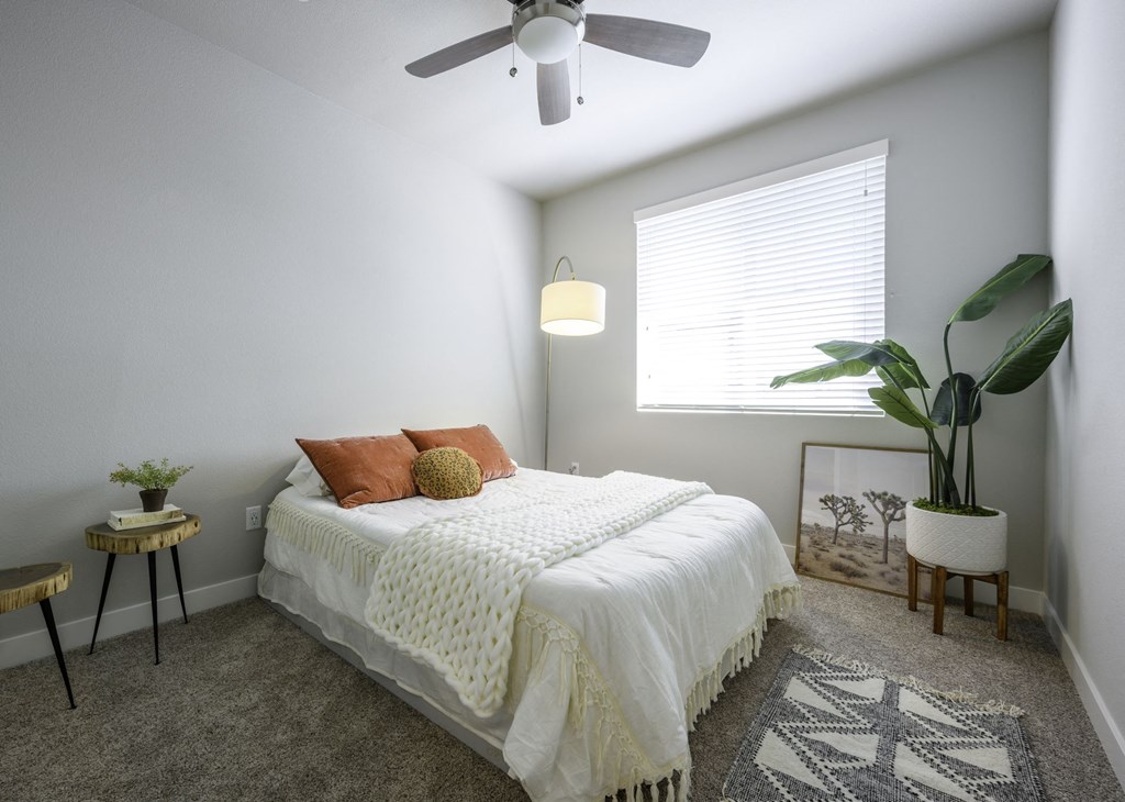 Bedroom with Bed and Fan