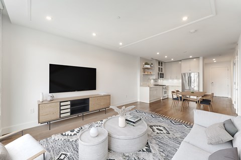 a living room with a couch and a tv