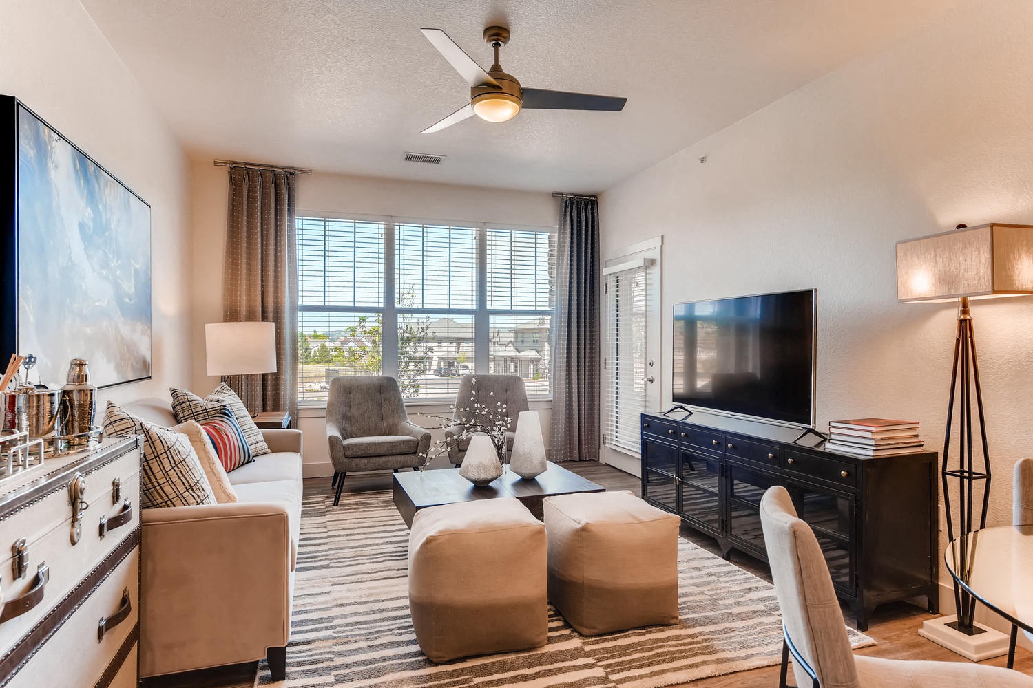 a living room with a couch and a tv