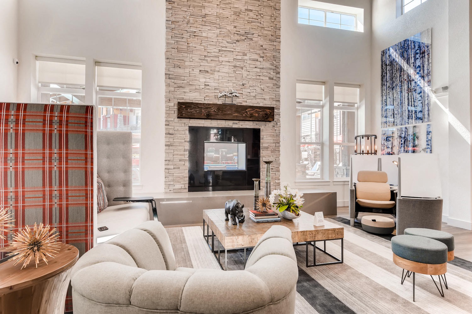 a living room with a couch and a fireplace