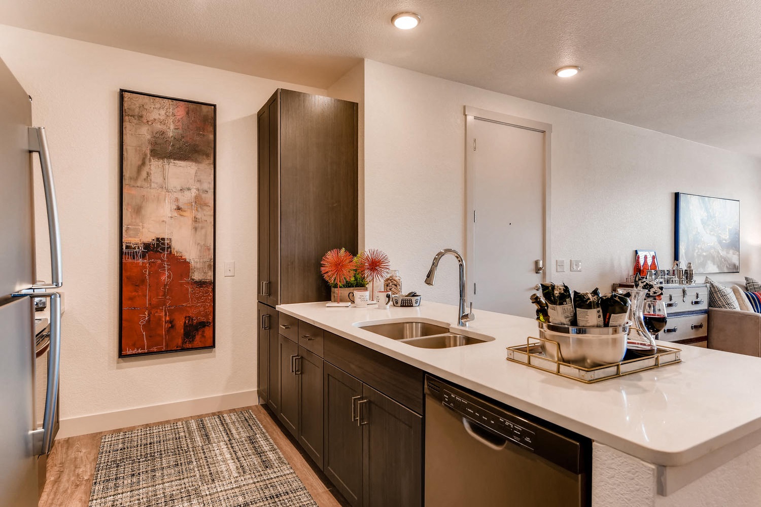 a kitchen with stainless steel appliances and a sink