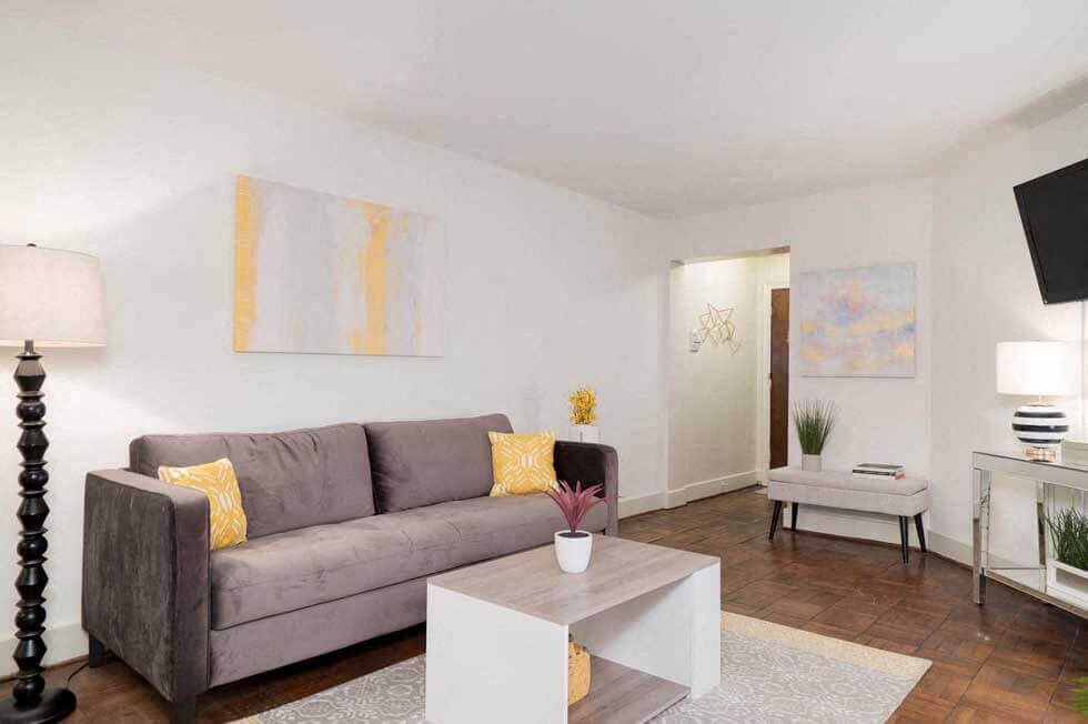 a living room with a couch and a coffee table