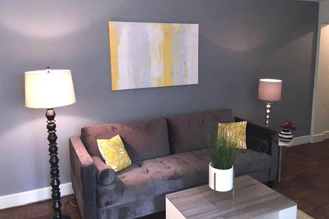 a living room with a couch and a coffee table