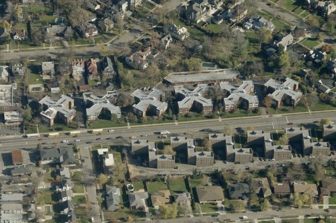 an aerial view of houses and a highway