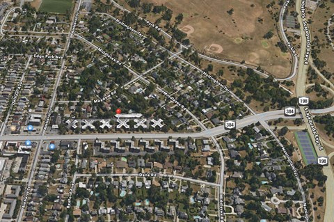 a map of a city with a road and buildings