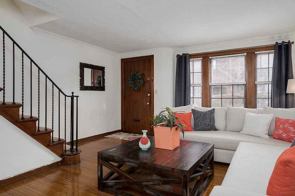 a living room with a couch and a coffee table